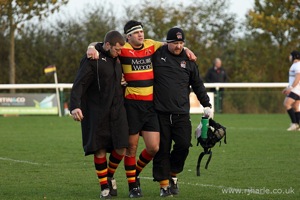 Helping the Injured Player Off