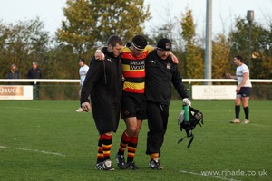 Helping the Injured Player Off